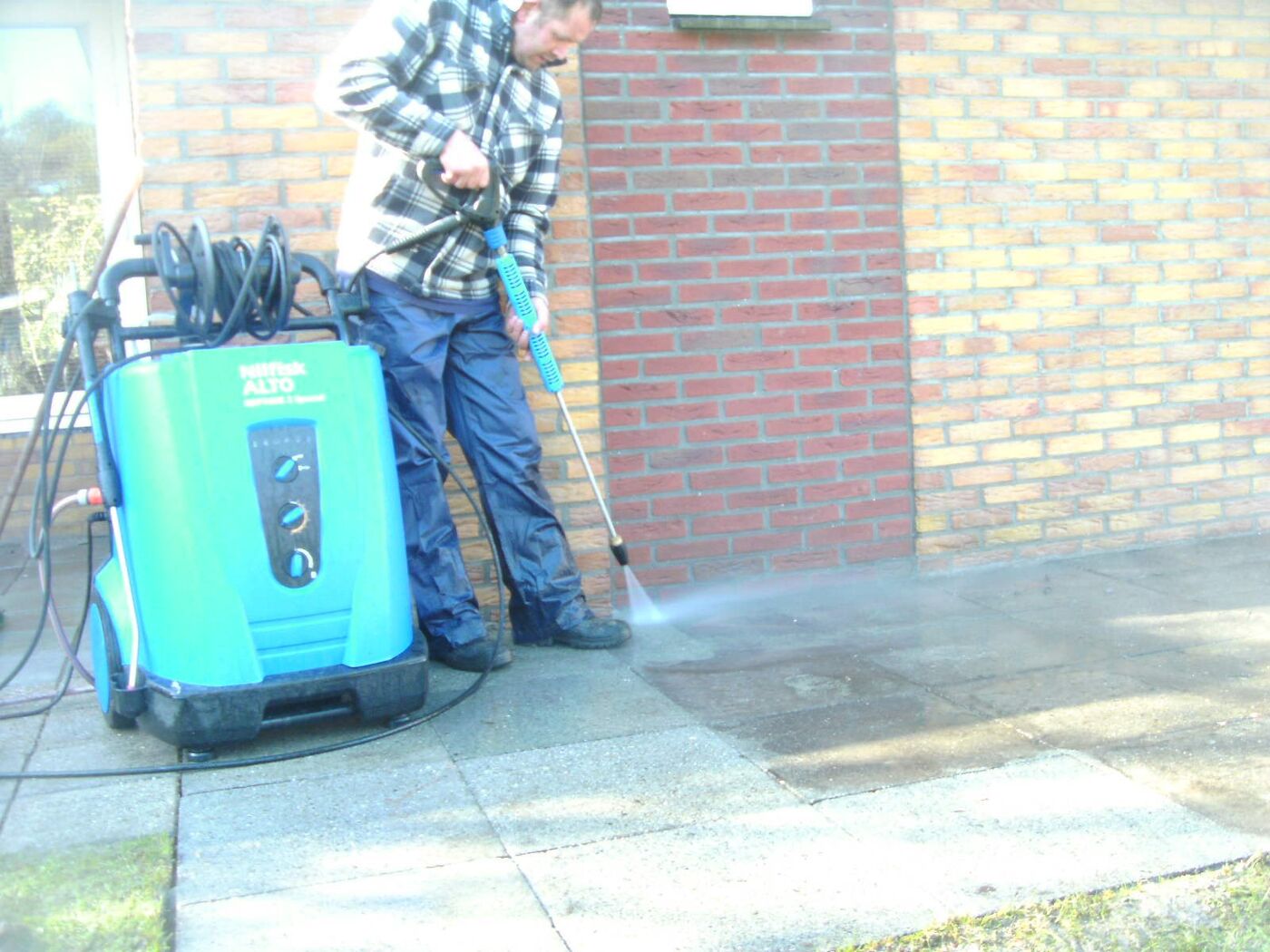 Hogedrukreiniging van bestrating